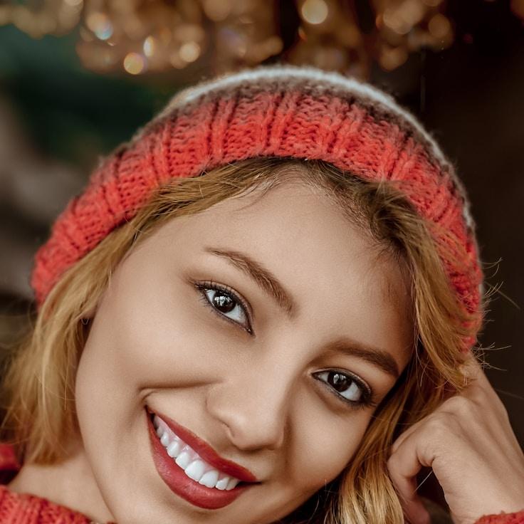 Kaveri Mehta, Lead Design Curator at Quartz Grove Bridge, reviewing corporate floral arrangements